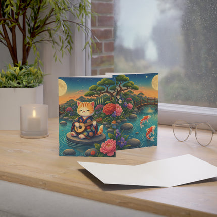 🌕🎸 The Moonlight Koi Serenade Kitten Greeting Card – Whimsical Japanese Garden