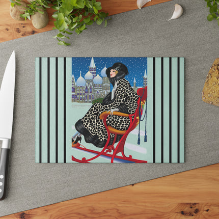 Elegant Winter Woman in Sleigh Glass Cutting Board