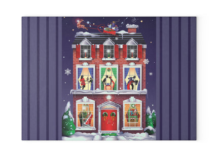A Christmas Eve Celebration Glass Cutting Board