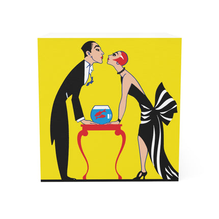 A Moment of Elegance: A Passionate Embrace Amidst Golden Splendor Note Cube