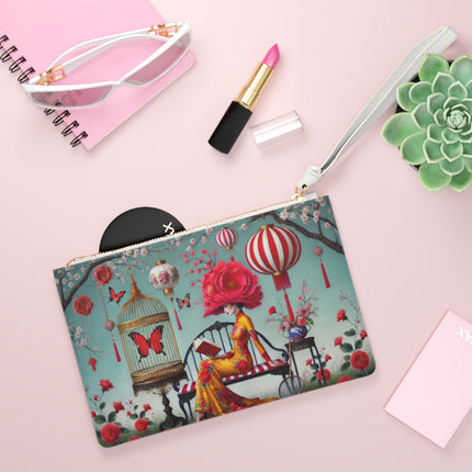 Reading In A Painted Garden Clutch Bag