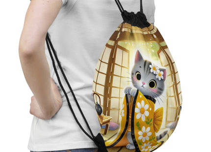 Playful Kitten in the Tea Room Drawstring Bag