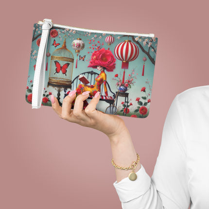 Reading In A Painted Garden Clutch Bag