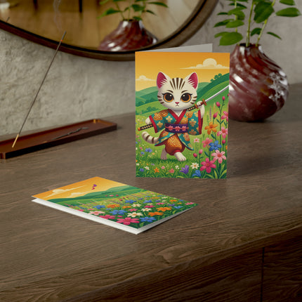 🐱🌼 The Wildflower Samurai Kitten Greeting Card – Whimsical Warrior Adventure