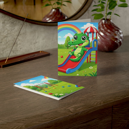 🐊🌈 The Little Crocodile Playground Adventure Greeting Card – Whimsical Animal Adventure