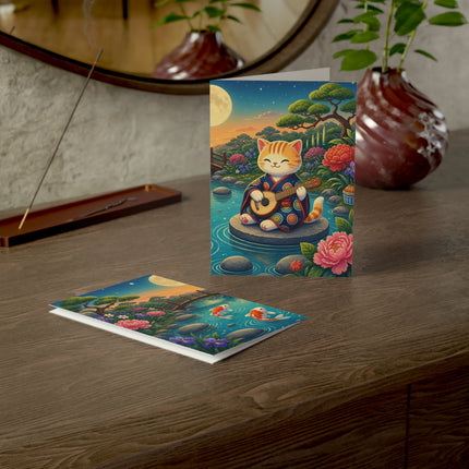 🌕🎸 The Moonlight Koi Serenade Kitten Greeting Card – Whimsical Japanese Garden