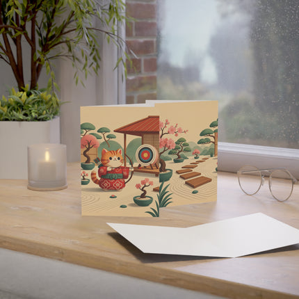 🏹🌸 The Cherry Blossom Archer Kitten Greeting Card – Whimsical Japanese Garden