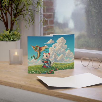 🐉🌼 The Dragon Kite Meadow Kitten Greeting Card – Whimsical Floral Adventure