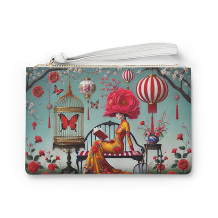 Reading In A Painted Garden Clutch Bag